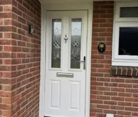 GRP composite front door in white with decorative glass fitted in Belper, Derbyshire
