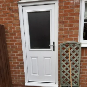 GRP composite door in White with Sandstone glass fitted in Derby