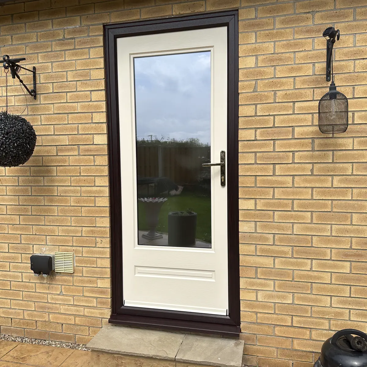 Rockdoor Classic in Cream, Rosewood external frame and Sandstone glass fitted in Sheffield