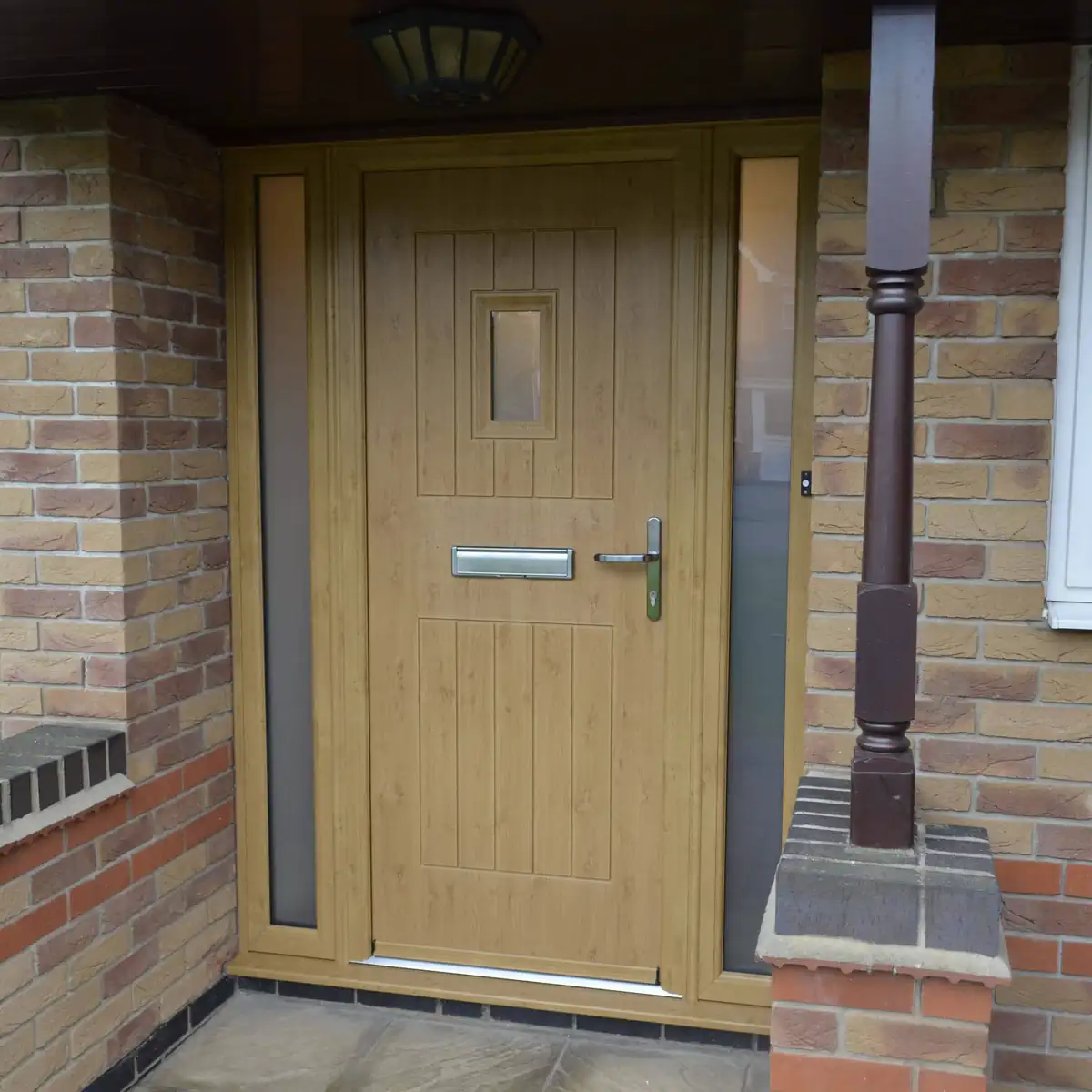 Rockdoor Cottage Spy View in Irish Oak with two thin Satin glass sidepanels and matching external frame fitted in Leicestershire