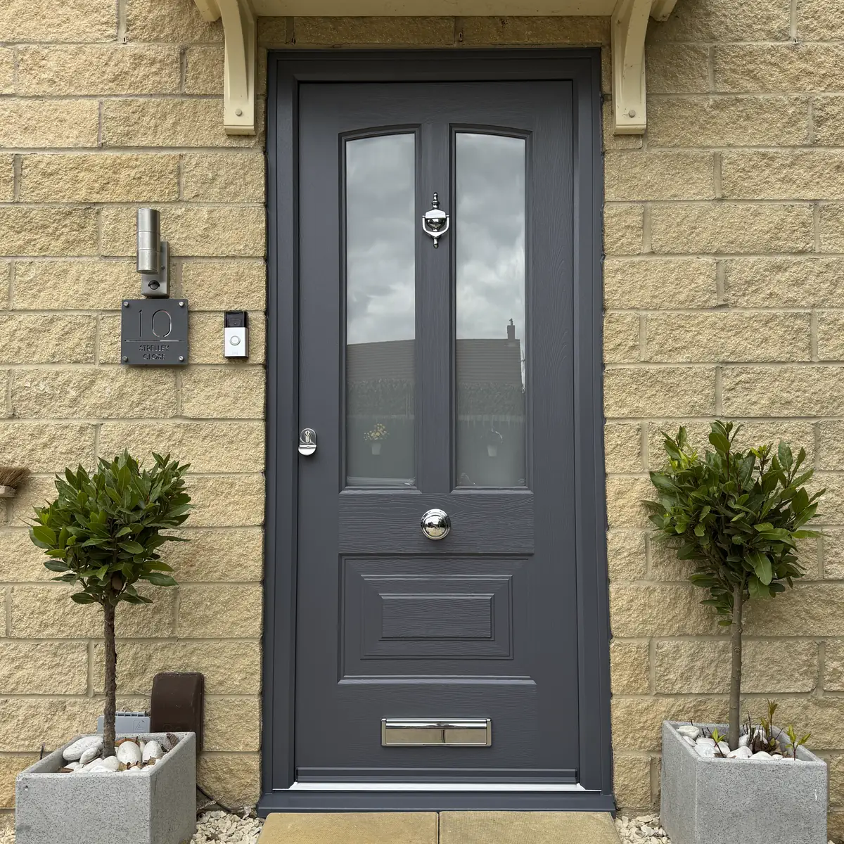 Composite door in Slate Grey with matching external frame, finger pull and door knocker fitted in Hucknall, Nottinghamshire