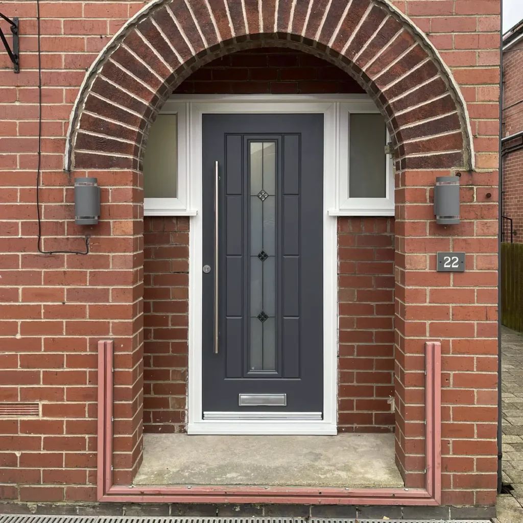 Composite door in Slate Grey with long bar handle and Decorative Glass fitted in Mansfield, Nottinghamshire
